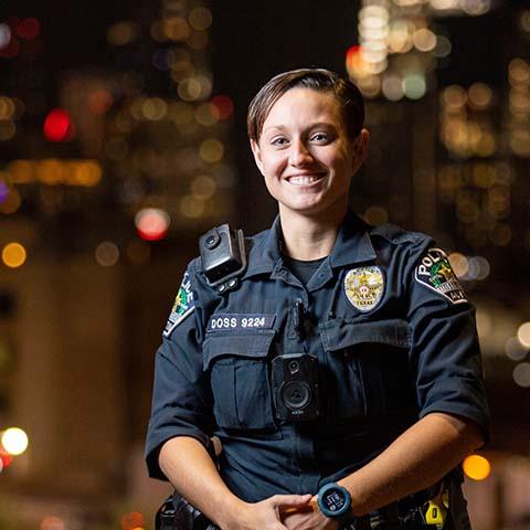 Police Officer Doss with Downtown Background