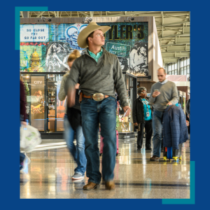  Image of traveler walking through the concourse