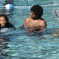 Bijan Robinson Teaches Kids to Swim to Raise Awareness About Water Safety with Nonprofit Tankproof and Austin Parks and Recreation