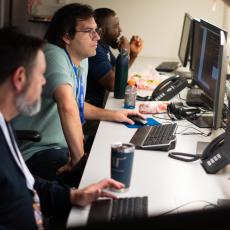 Three City employees working in the emergency operations center
