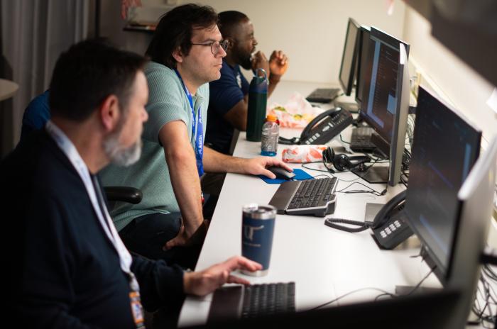 Three City employees working in the emergency operations center