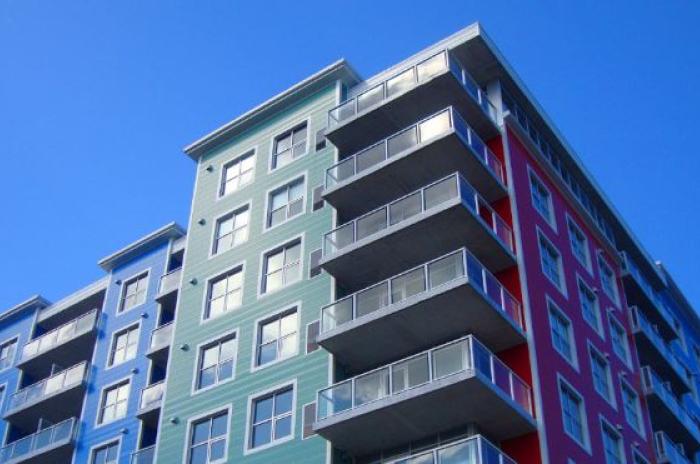 Image of a blue apartment building
