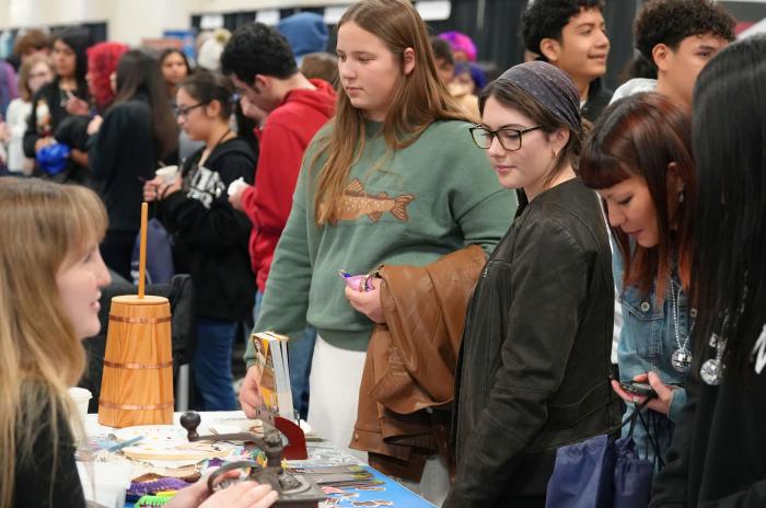 Women talking to children