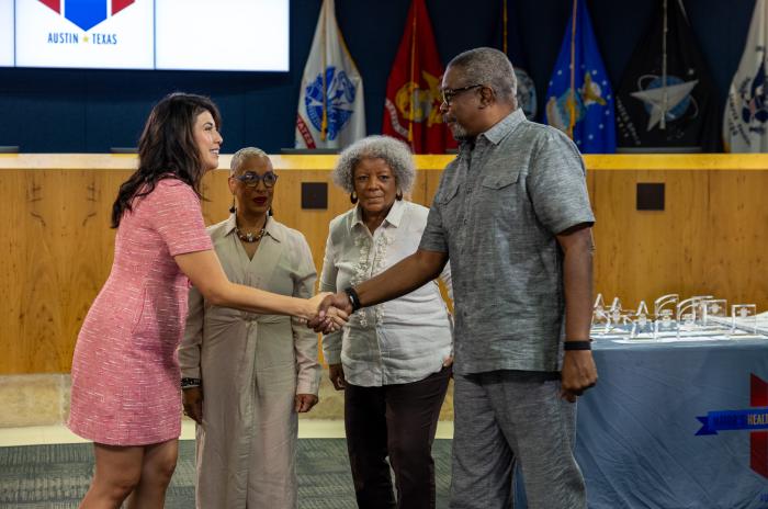 Austin Mayor Pro Tem Vanessa Fuentes presents an award on behalf of Mayor’s Health & Well-Being Council.