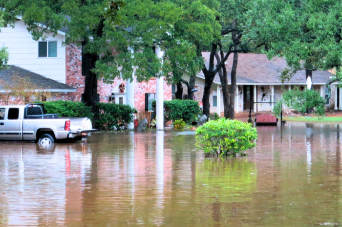 Photo of house and floodwaters