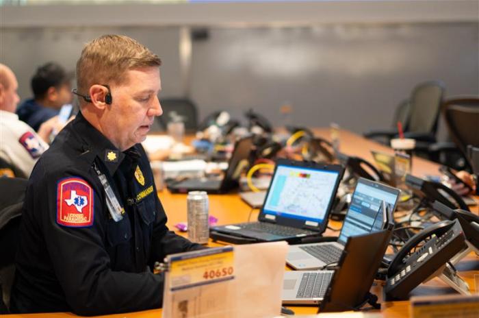 An ATCEMS Commander works in the EOC
