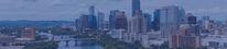 Photo of Austin city skyline centering on downtown and the river