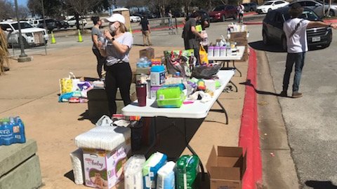 Water Distribution table set up somewhere in Austin