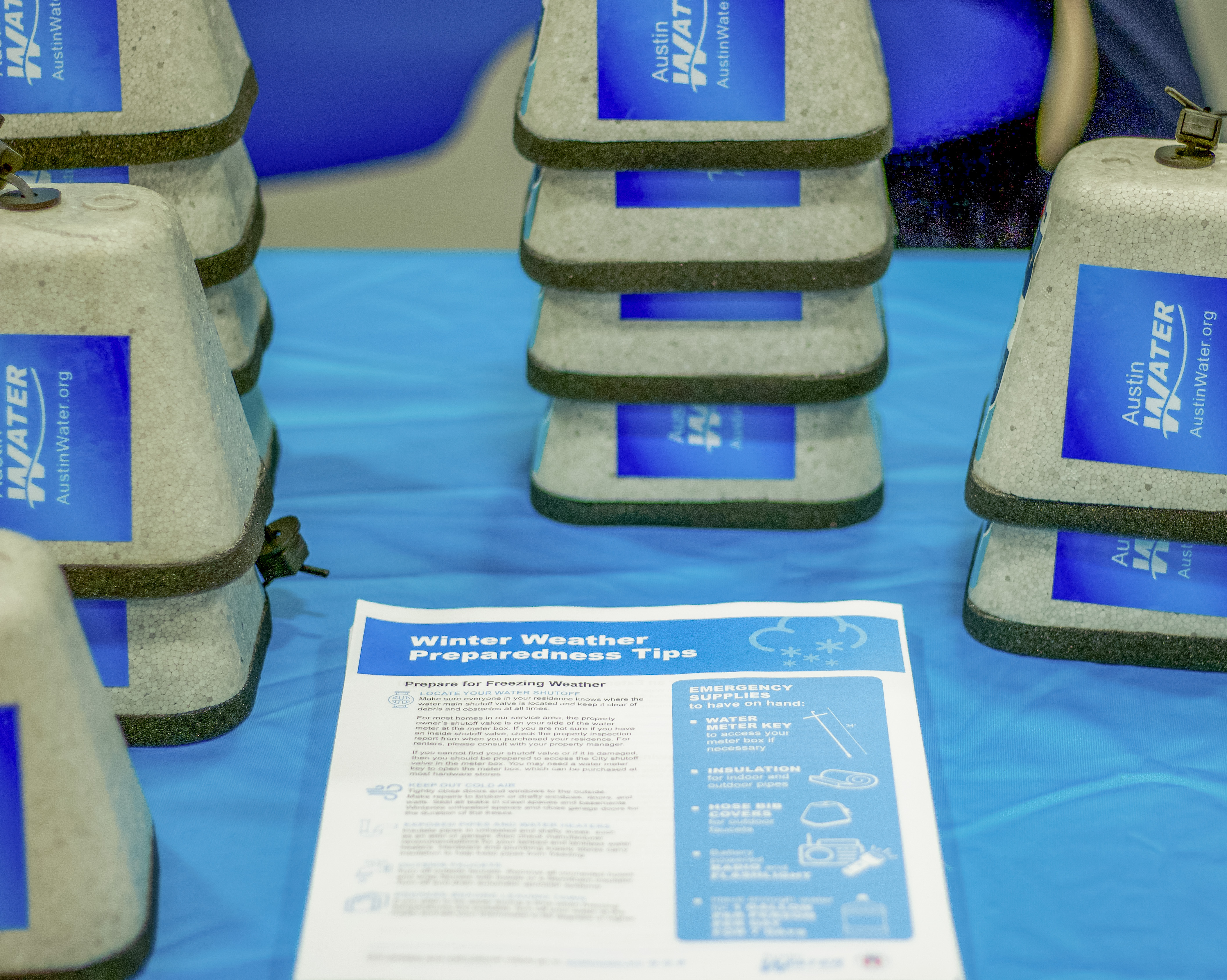 Winter Tips from Austin Water image of hose bib covers and winter tip sheets